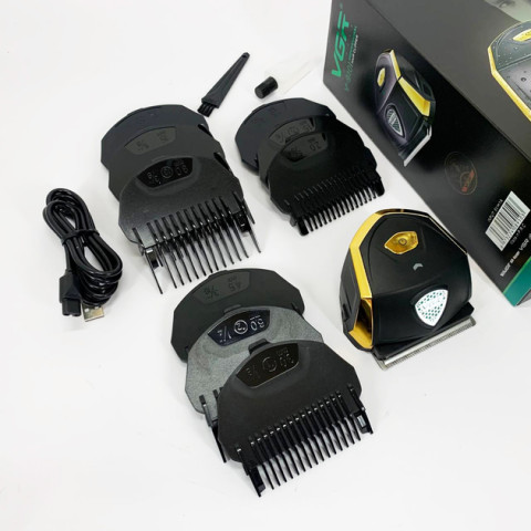 Машинка для стрижки VGR V-910 акумуляторна з 9 насадками